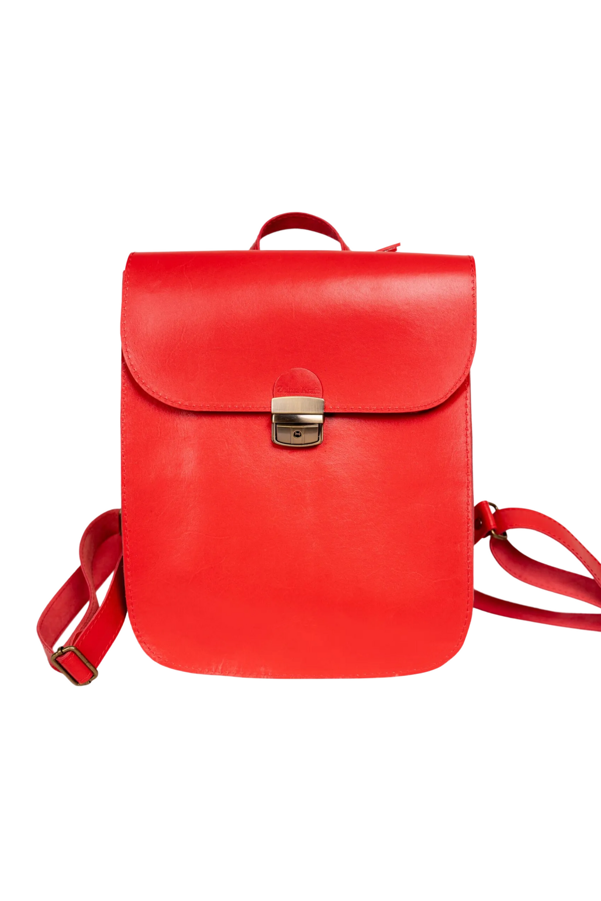 Handmade red full-grain leather backpack developing a natural patina