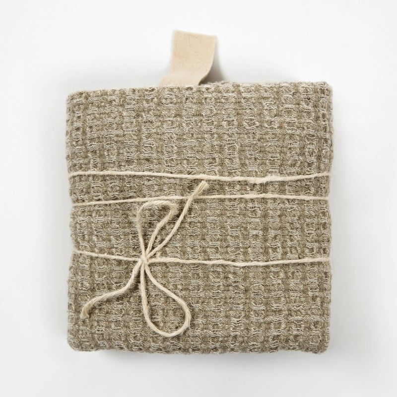Folded natural grey linen waffle towel
