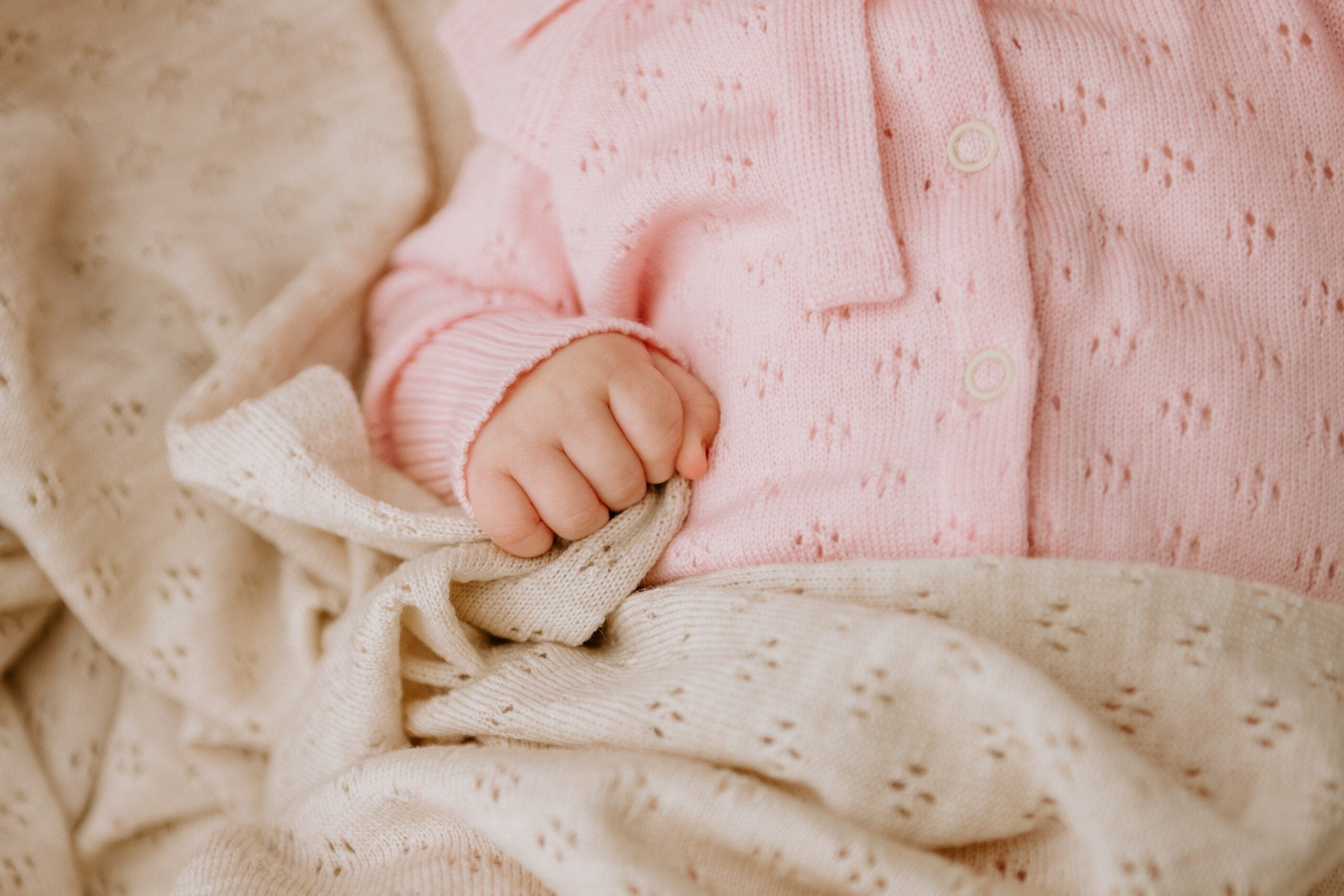 Nordic handmade gifts — a merino baby set styled as a considered present
