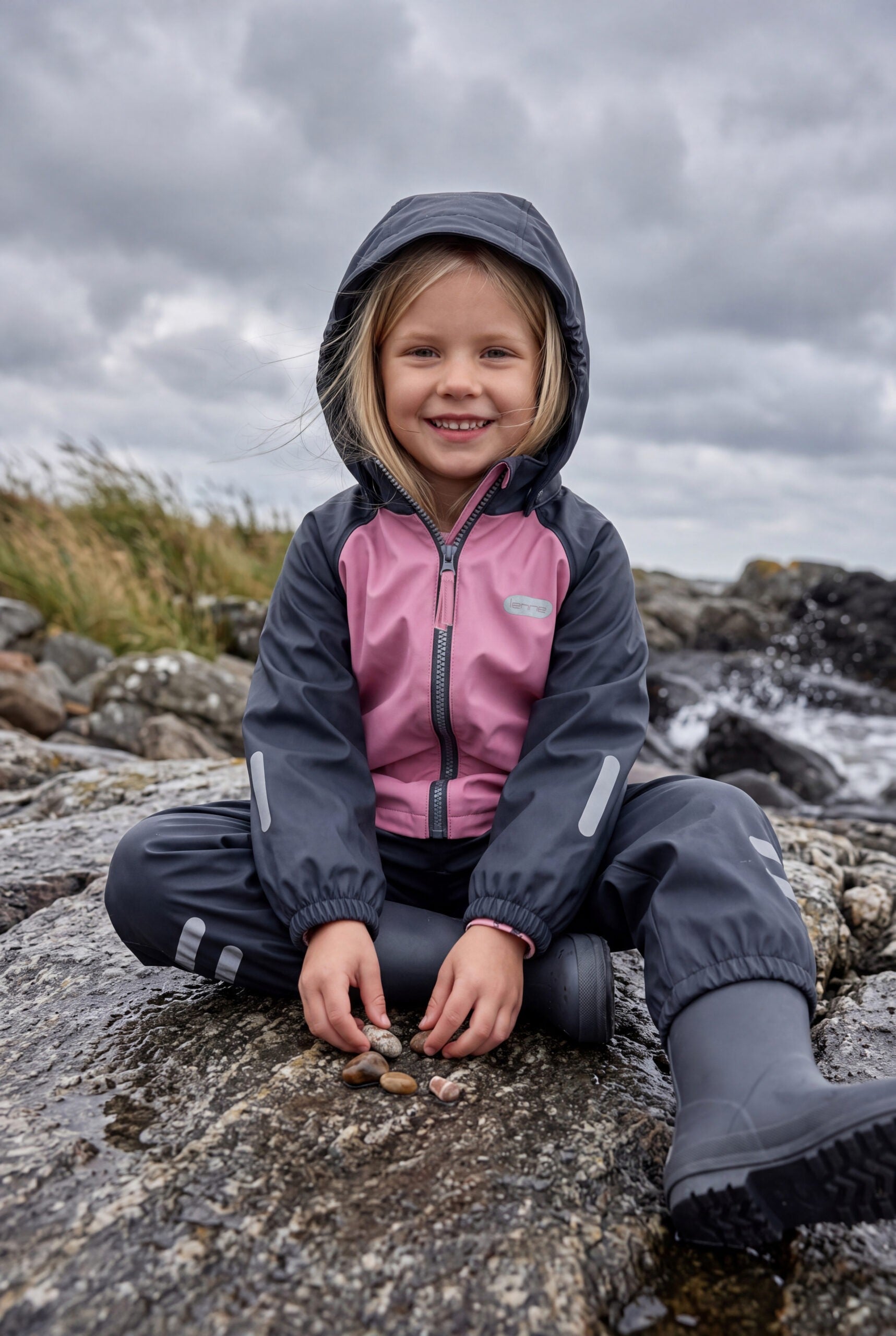 New arrivals at Snøluv: girl in a pink and navy fleece lined rain set by Lenne