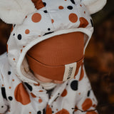 Winter Jumpsuit with Teddy Lining for Babies and Kids - Black and Orange Dots